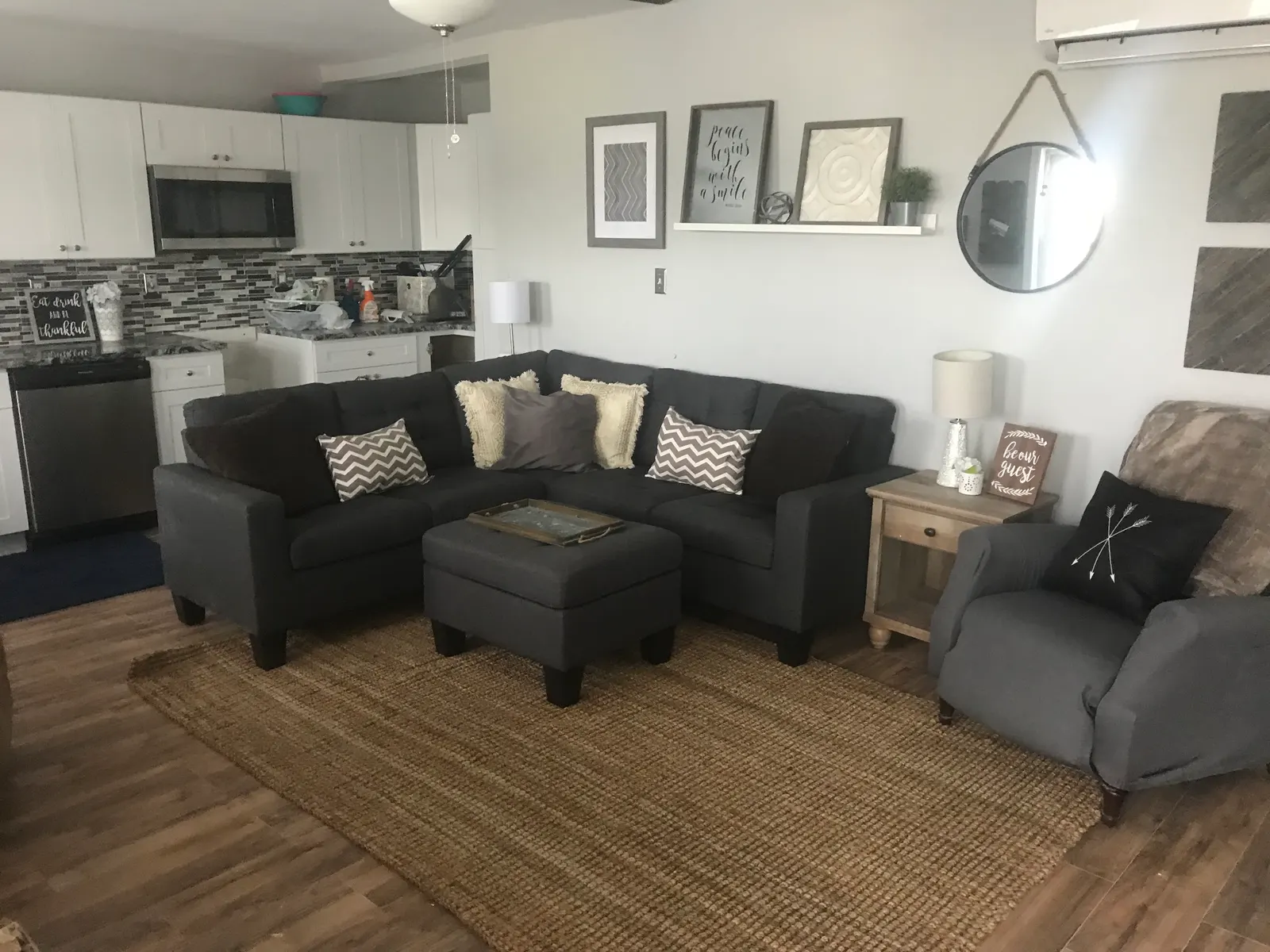 Farmhouse Chic by the Shore living room with a charcoal sectional