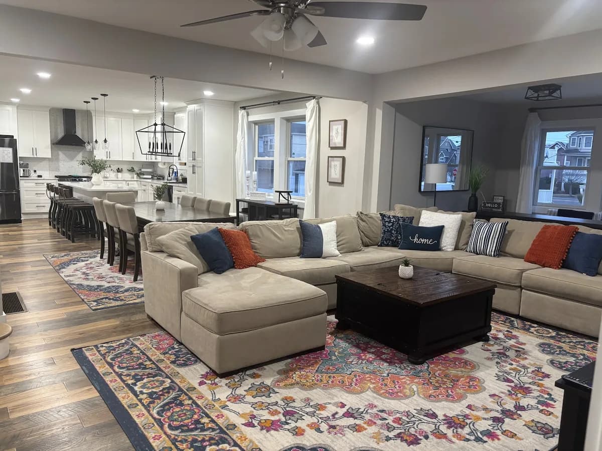Open living room connecting the kitchen and dining spaces