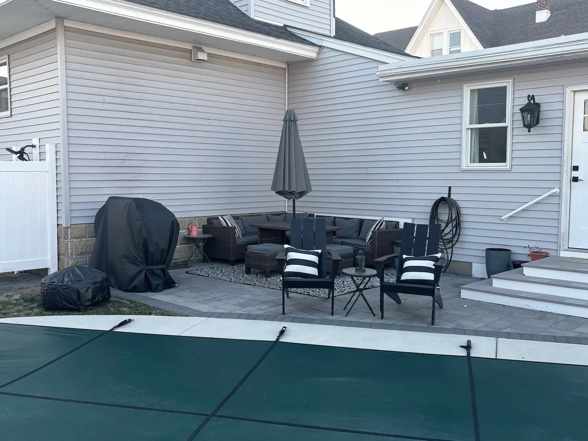 Backyard patio with grill and relaxed seating