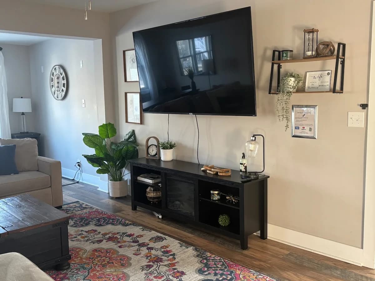 Media wall and fireplace in the main living room