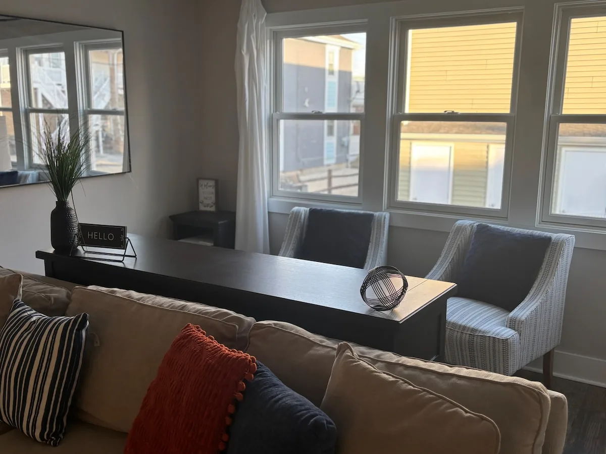 Pair of reading chairs beside the living room windows