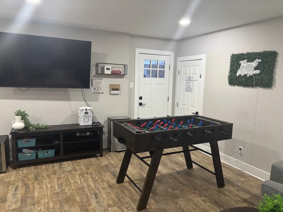 Game room media wall and foosball table