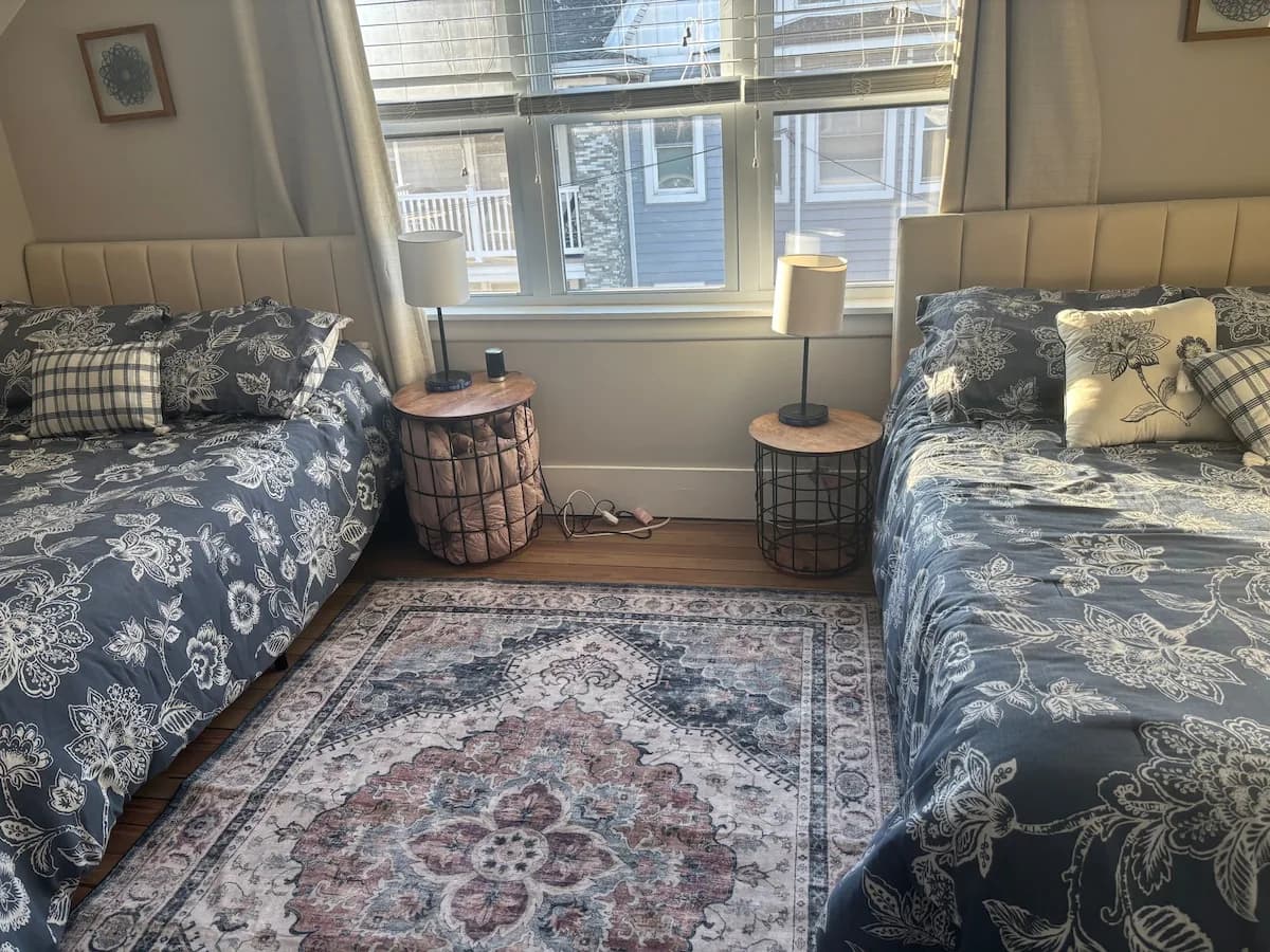 Twin-bed guest room designed for shared stays