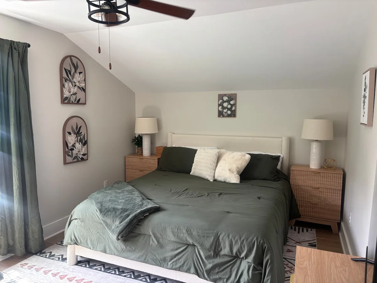 Calm bedroom with a generous upholstered bed