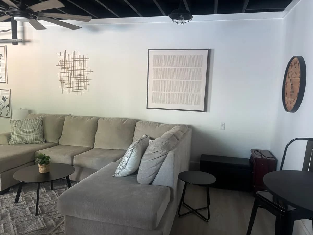 Second lounge with soft seating and shore-house character