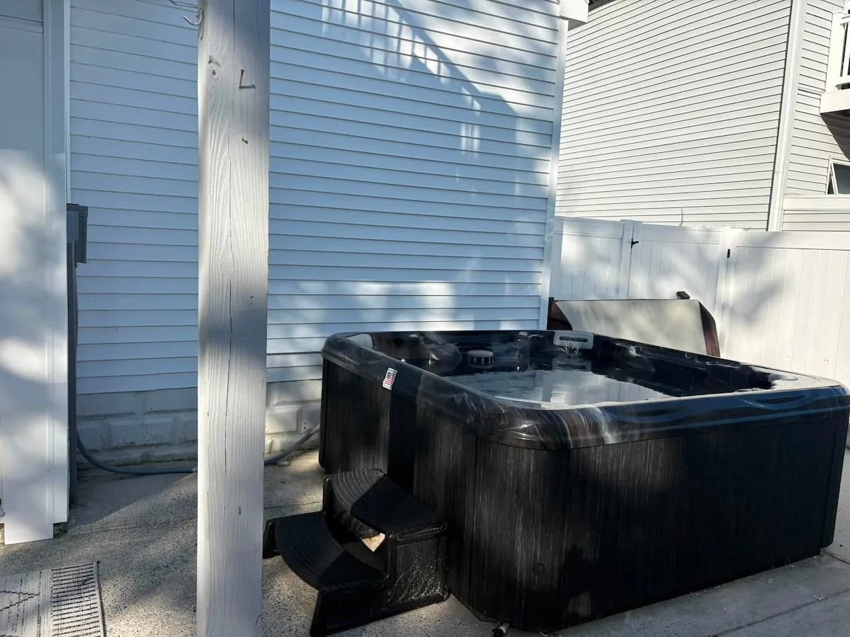 Private hot tub beside the house