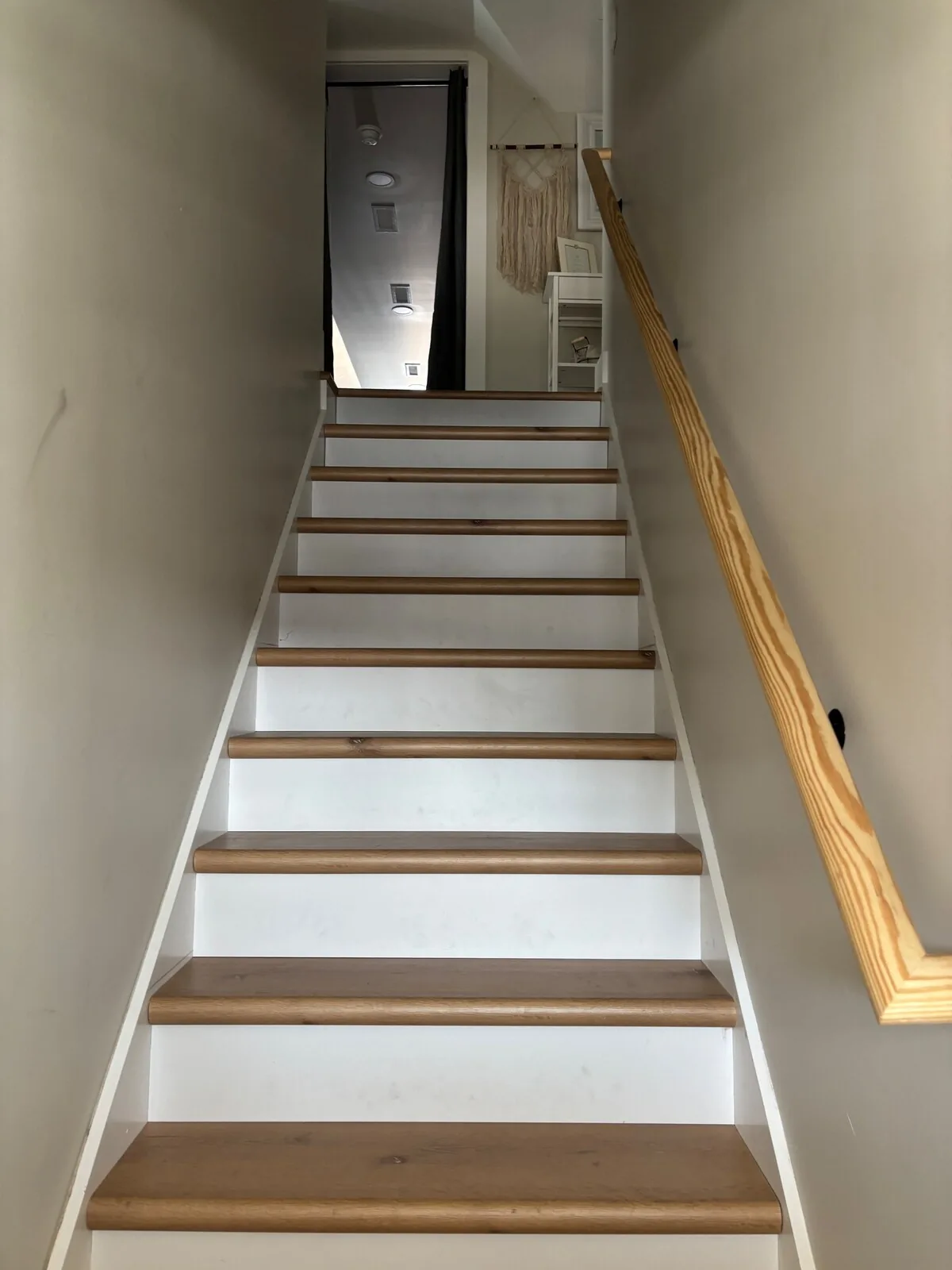 Interior staircase leading to the separate upper level
