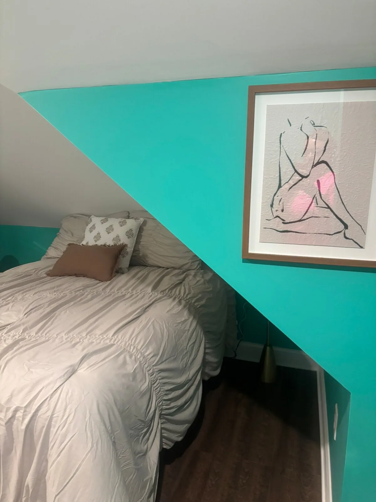 Cozy tucked-away bedroom beneath the eaves