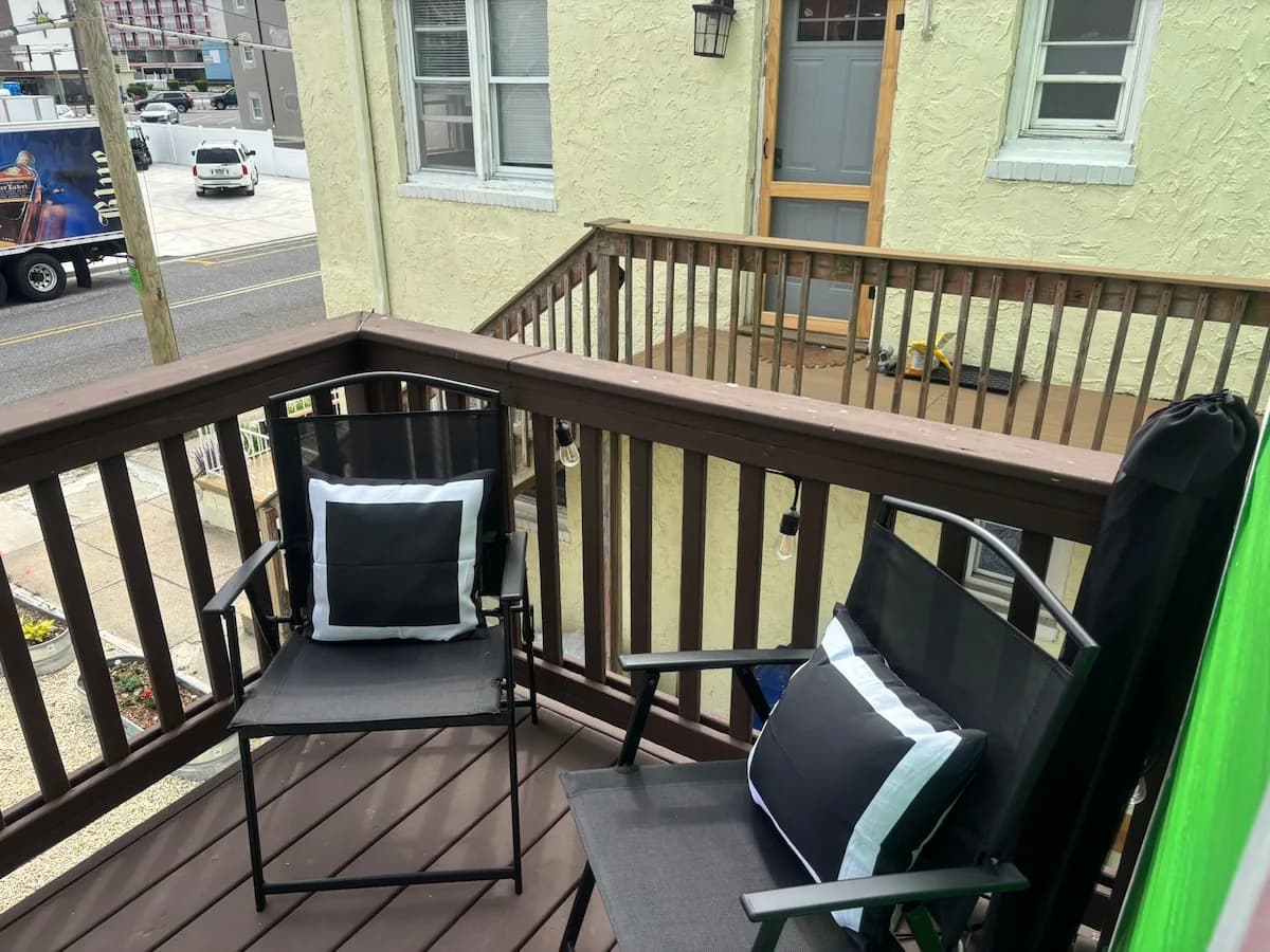 Upper wooden deck with a quiet seating corner